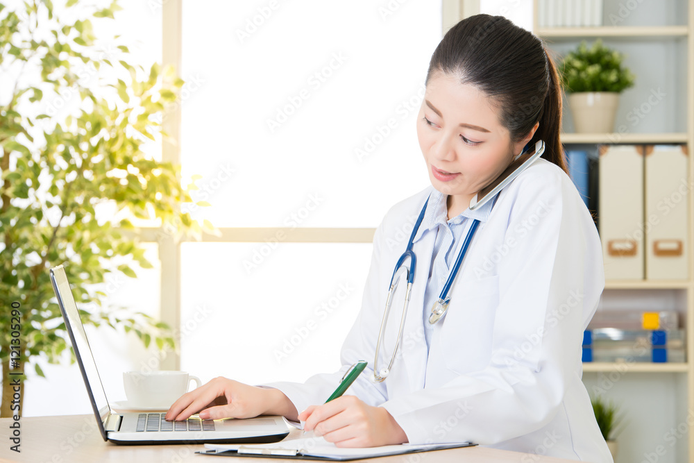 Doctor explain patient's condition by smart phone and computer Doctor explain patient's condition by smart phone and computer