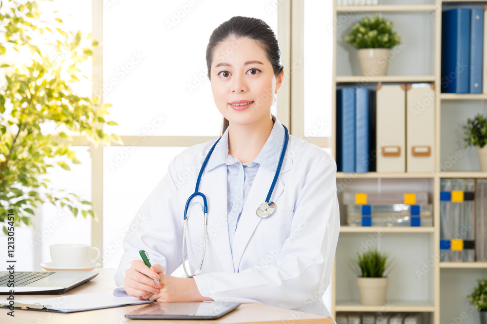 doctor using digital tablet to recording patient's medical case doctor using digital tablet to recording patient's medical case