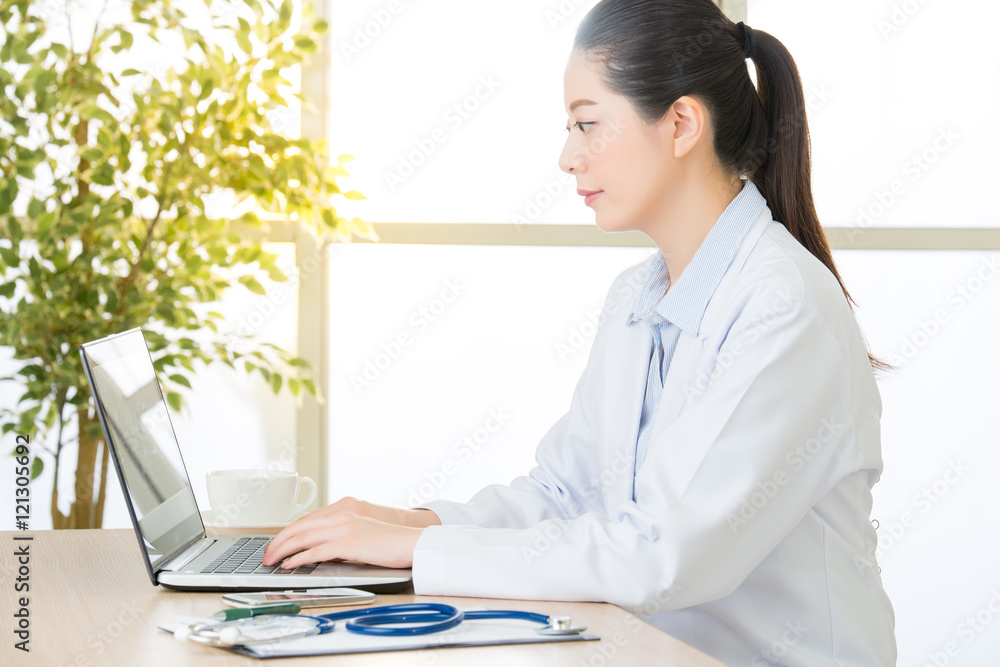 Doctor using computer to research internet, healthcare and medic Doctor using computer to research internet, healthcare and medic