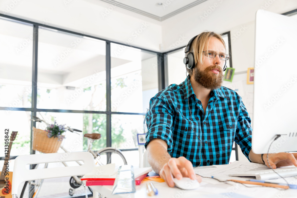 Young man working in office Young man working in office