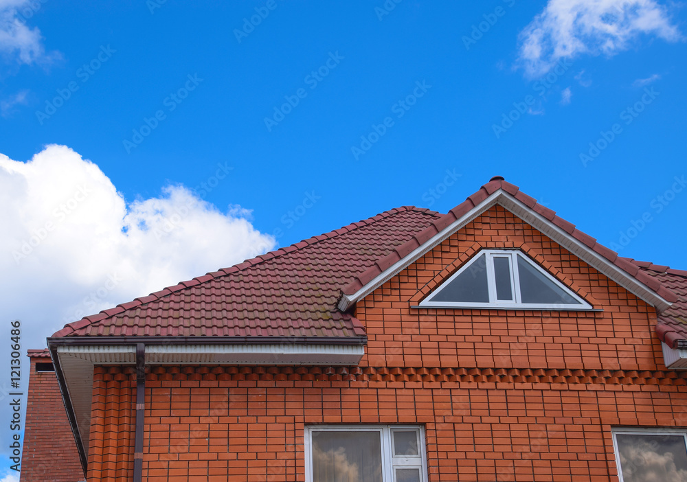 The house with a roof of classic tiles