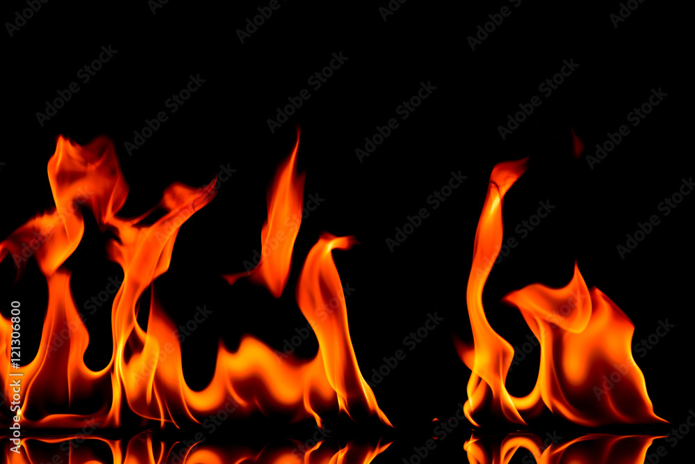 Fototapeta premium Fire flames on black background