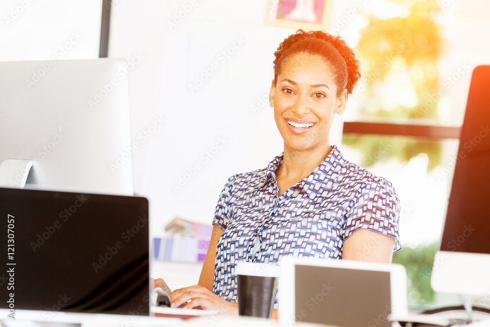 Portrait of smiling afro-american office worker in offfice Portrait of smiling afro-american office worker in offfice