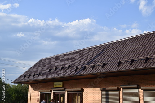 The roof of corrugated sheet on a building