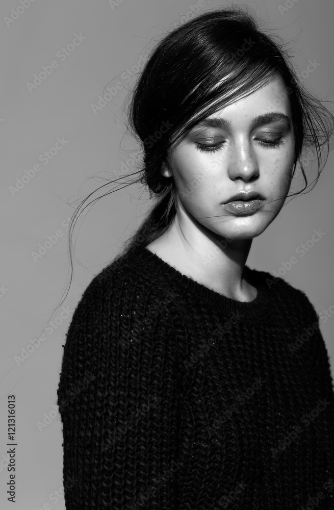 Portrait of beauty young brunette woman portrait in black fashio