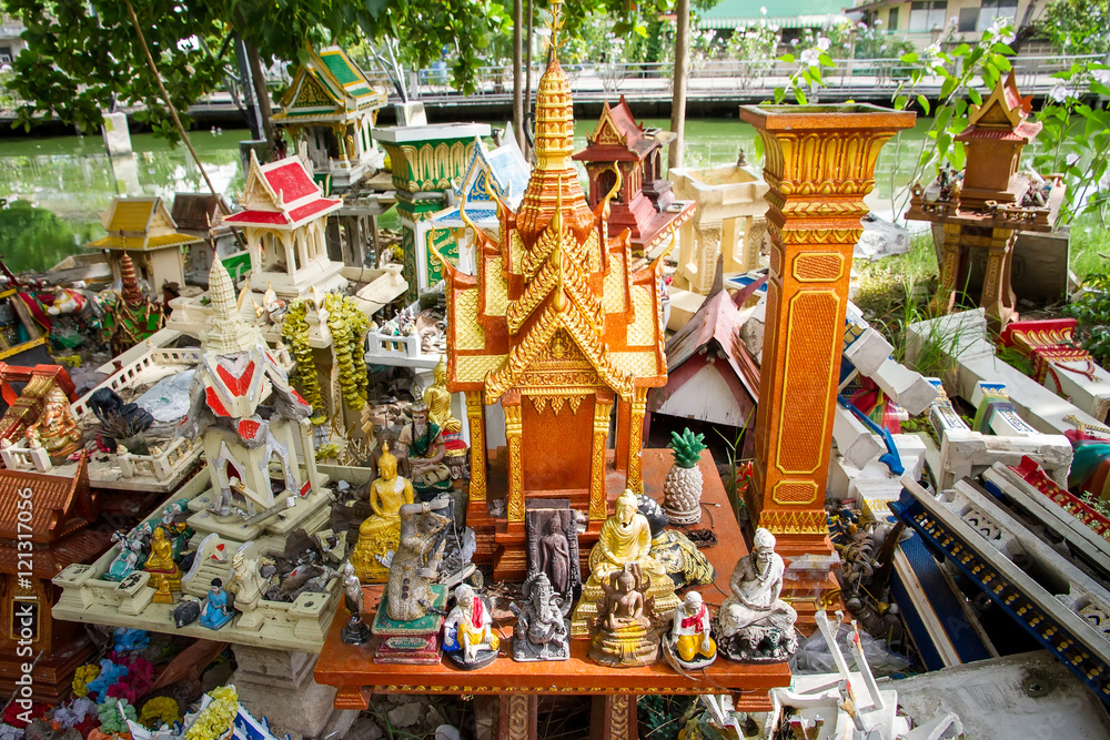 Spirit House Thailand that were damaged were left at the side of