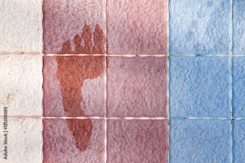Fototapeta premium footprint on the floor tiles.