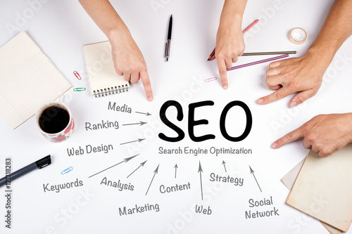 SEO Search Engine Optimization concept. The meeting at the white photo