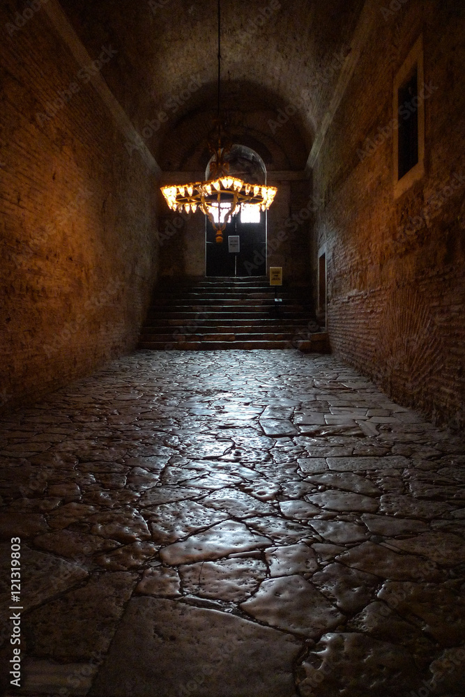 Hagia Sofia Basilica path walk to upper floor with stone floor and brick walls