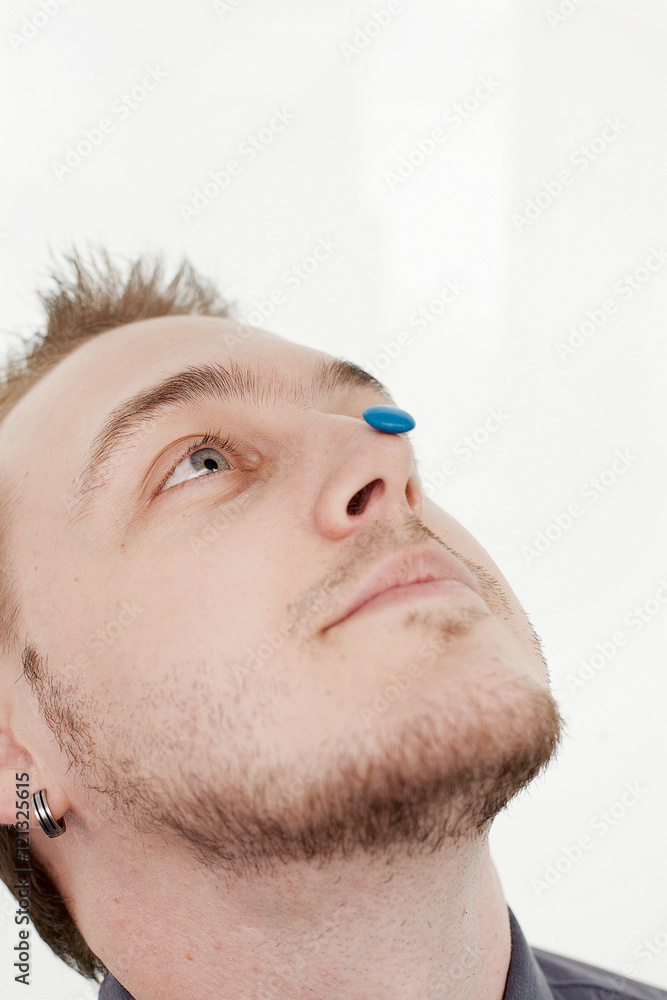 Obraz premium Man with round candy