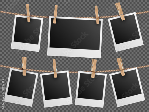 Retro photo frames hanging on rope isolated checkered transparent background vector illustration photo