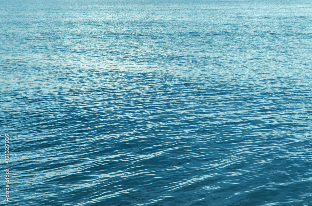 Fototapeta premium Abstract Blue Sea surface with waves, background.