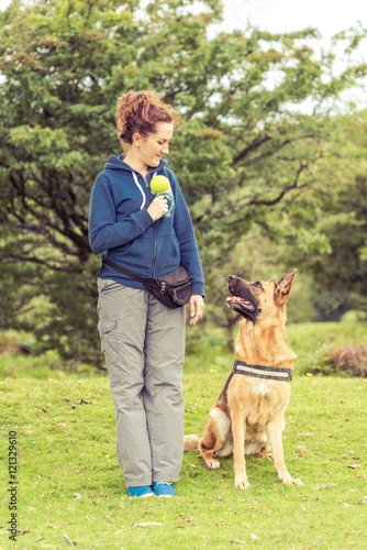 woman dog trainer and dog