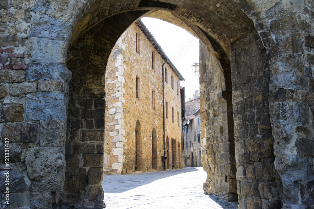 Old small stone medieval street in historical center of Serra San Quirico D'orcia,Tuscany, (Italy) 