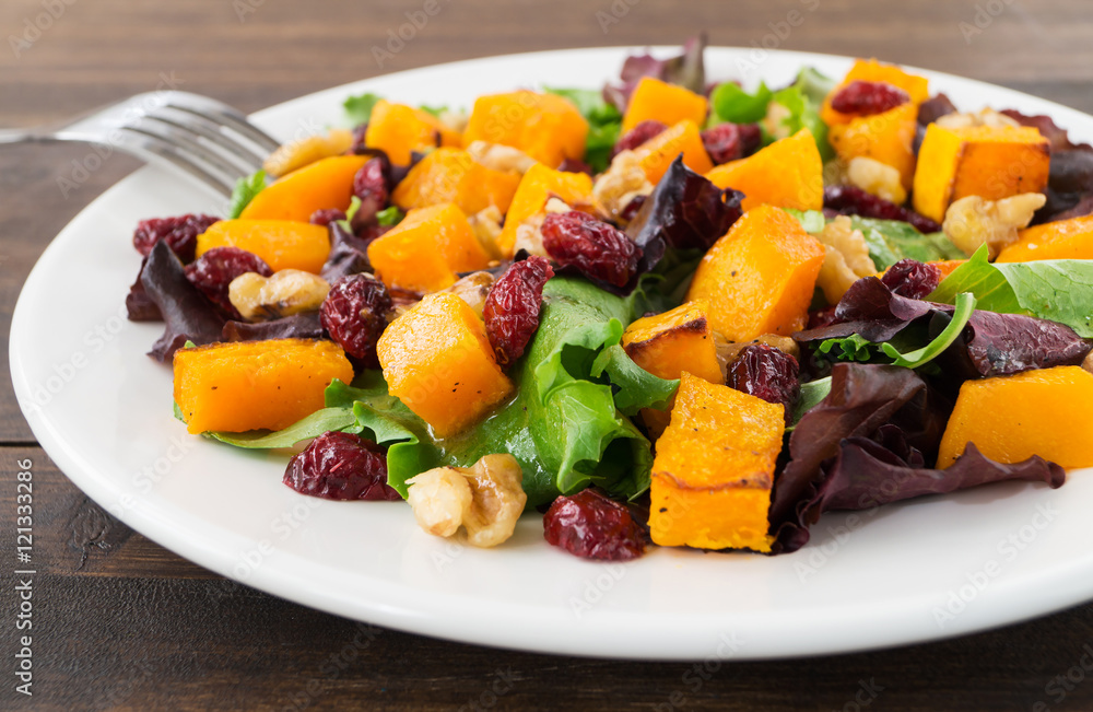 Autumn salad with roasted butternut squash, cranberry and walnut