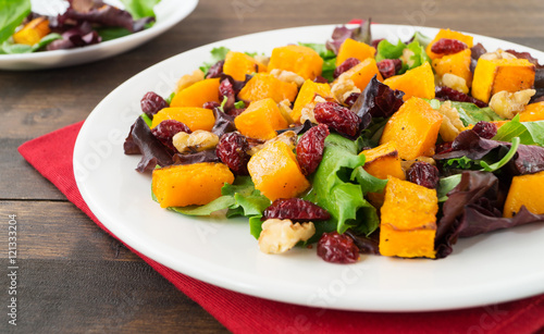 Autumn salad with roasted butternut squash, cranberry and walnut
