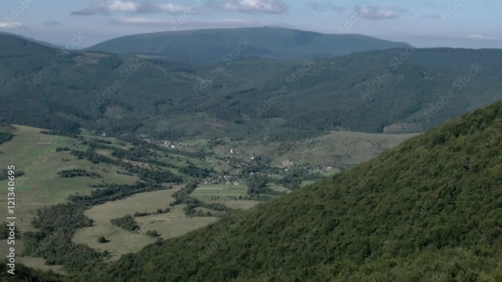 Village on the Slopes of the Carpathian Mountains, Mountain Valley Pan Time Lapse. Village on the Slopes of the Carpathian Mountains, Mountain Valley Pan Time Lapse.