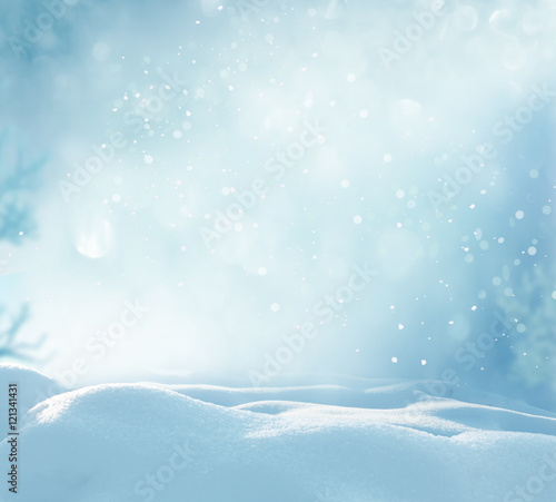Christmas winter background with snow and blurred bokeh © Lilya