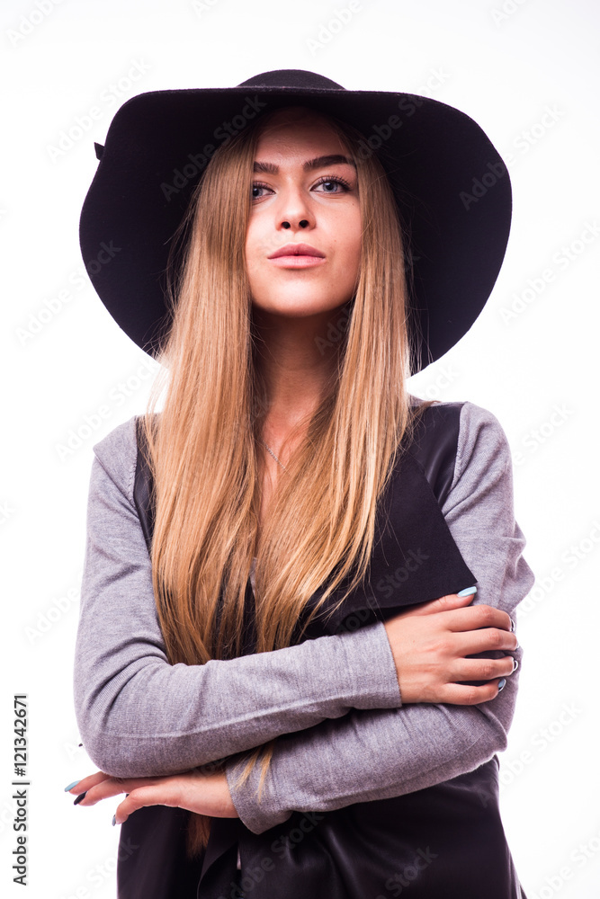 Beautiful young woman wearing summer black hat with large brim Beautiful young woman wearing summer black hat with large brim