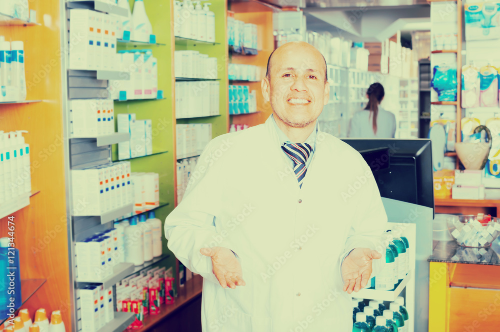 Male pharmacist in drugstore.