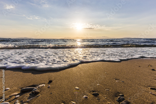 Sunrise on the beach, Rafina town, Greece