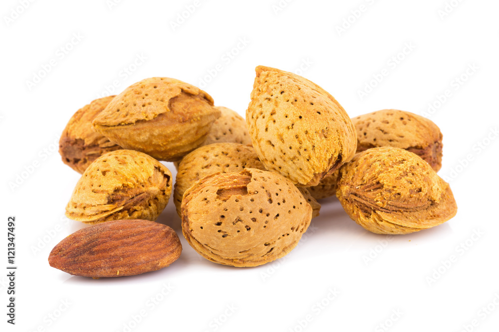 Almond nut in shell and shelled isolated on white background Almond nut in shell and shelled isolated on white background