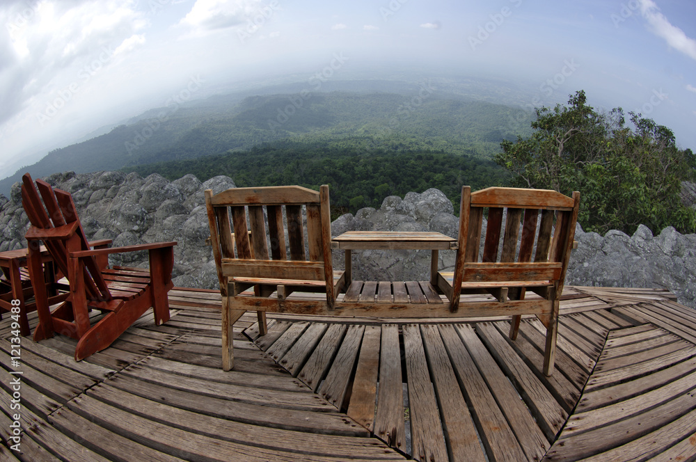 Wooden chair on mountain