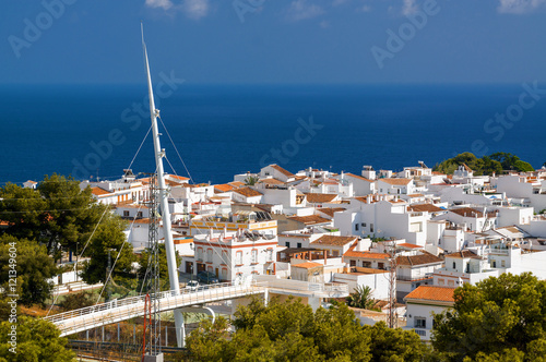 Sunny view of Nerja on background of Mediterranean sea, Andalusia province, Spain. © Neonyn