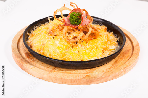 fried potatoes with cheese and meat