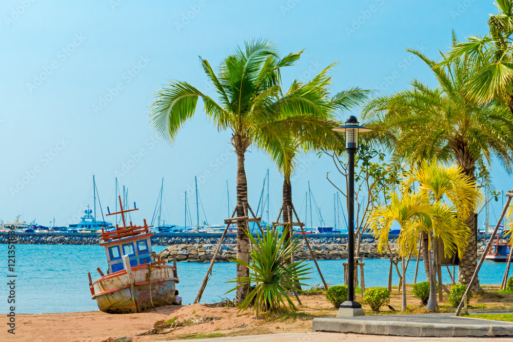 Old rusted boat at the beach of Pattaya
