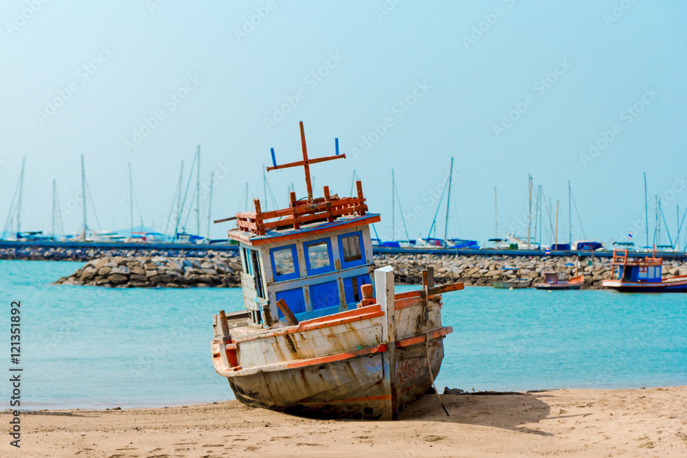 Old rusted boat at the beach of Pattaya Old rusted boat at the beach of Pattaya