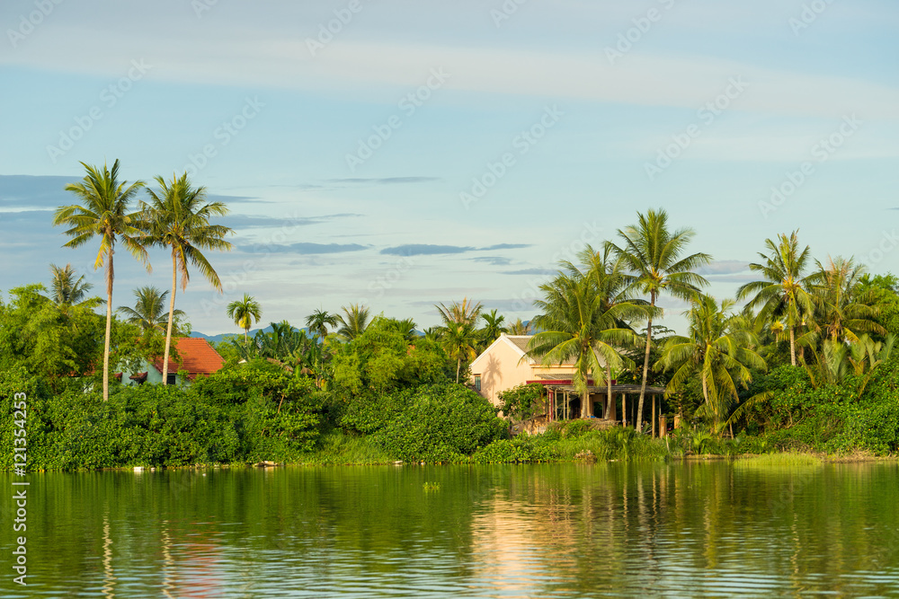 Houses along the Thu Bon river near Hoi An Houses along the Thu Bon river near Hoi An