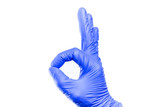 Hand in blue glove isolated on white showing ok sign.