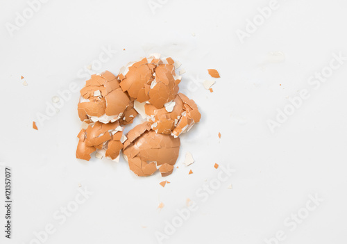 Group of broken chicken eggshells on white background.