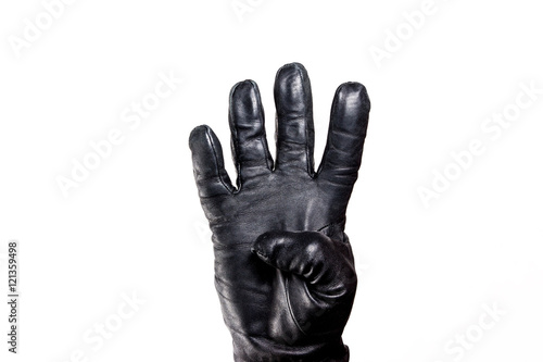 Showing fingers hand in black leather glove isolated on white.