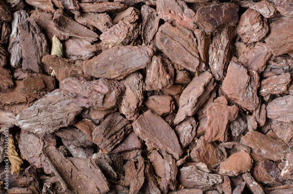 background of small chopped tree bark pieces background of small chopped tree bark pieces