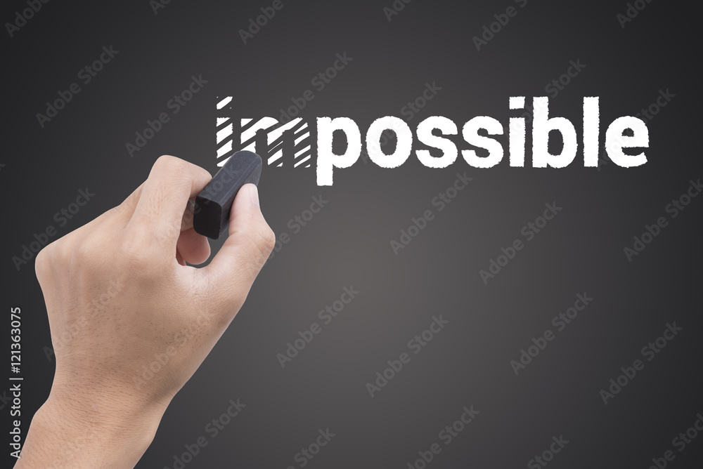 hand holding black eraser changing the word impossible to possible concept business possible hand holding black eraser changing the word impossible to possible concept business possible