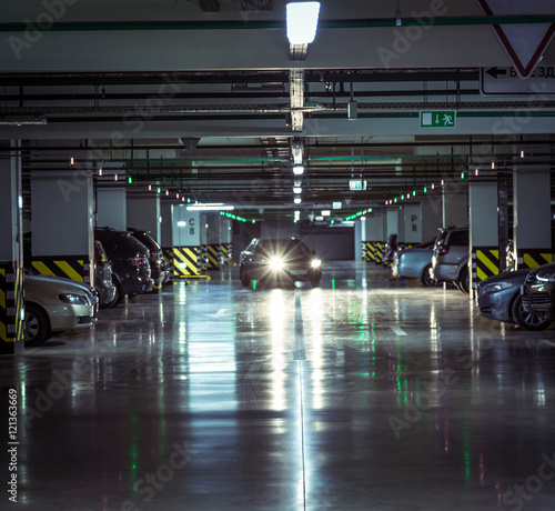 Parking garage, underground interior with a parked cars © Ruslan Gilmanshin