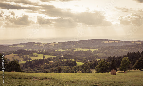 Dreamy panorama with gold cloudy sky