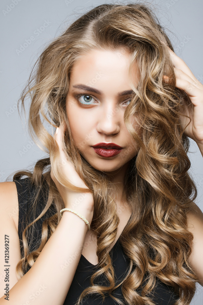 Close portrait of a beautiful sexy girl with big lips and eyes. Close portrait of a beautiful sexy girl with big lips and eyes.