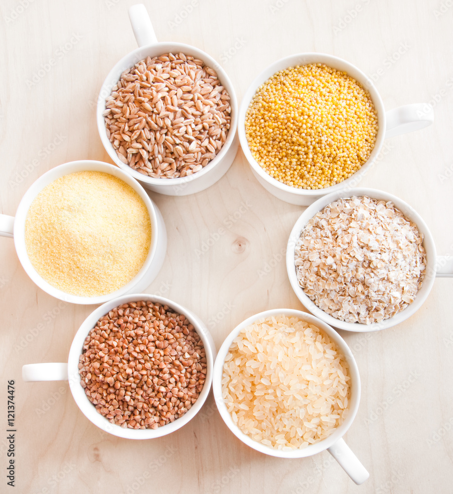 Different kinds of cereals: oats, millet, rice, buckwheat, wheat, spelt Different kinds of cereals: oats, millet, rice, buckwheat, wheat, spelt