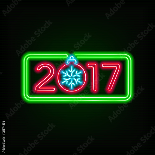 New Year neon sign. 2017 text and Christmas ball on a dark background photo