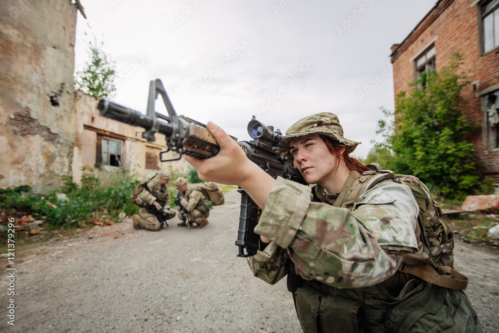 Fototapeta premium Army sniper during the military operation in the city. war, army