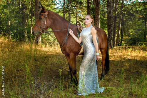 girl in a beautiful dress is a horse © Vadim Hnidash