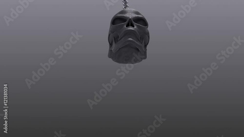 Skull rocks back and forth on the chain. Animation of swinging skull on chain with mask included.
