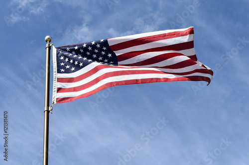 American flag against a blue sky