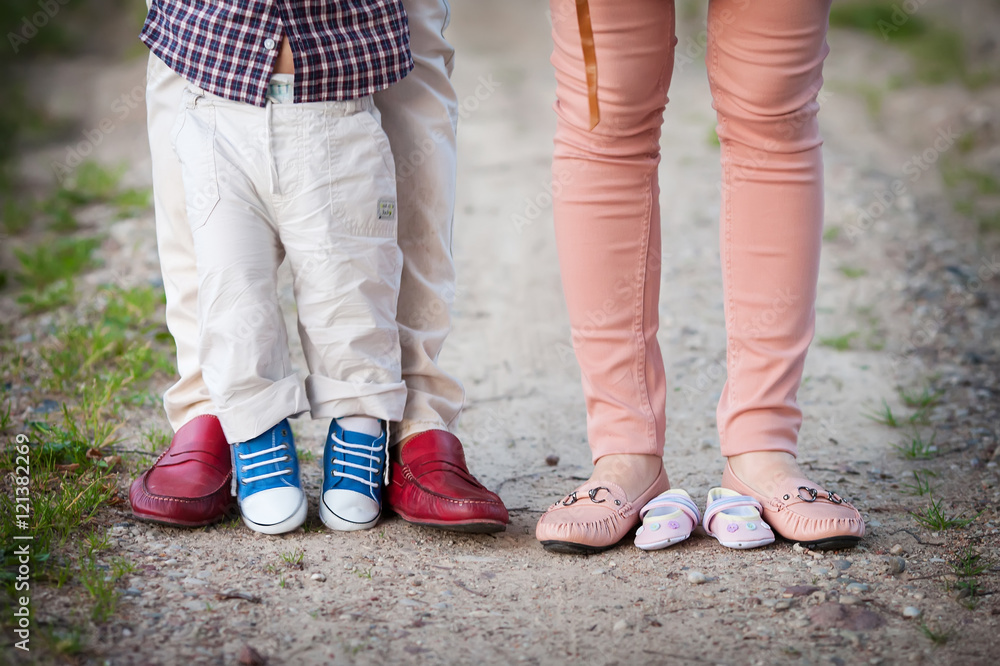 shoes and sneakers of parents and elder brother and expected bab