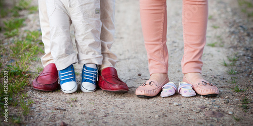 shoes and sneakers of parents and elder brother and expected bab