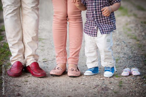 shoes and sneakers of parents and elder brother and expected bab