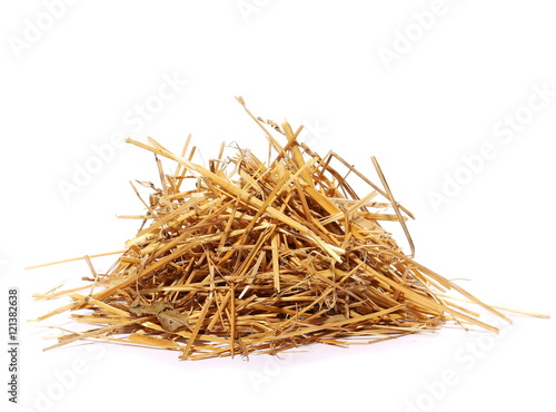 pile straw isolated on white background photo